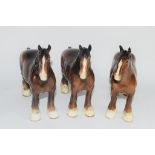 GROUP OF THREE BROWN COLOURED POTTERY CARTHORSES IN BESWICK STYLE