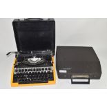 CASED TIPPA TYPEWRITER TOGETHER WITH A FURTHER TYPEWRITER