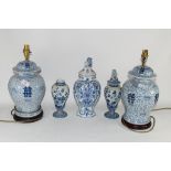 BLUE AND WHITE POTTERY WARES INCLUDING TWO CHINESE POTTERY VASES AND COVERS CONVERTED TO LAMPS AND A