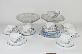 PART SHELLEY TEA SET IN AN ART DECO DESIGN WITH FLOWERS, PATTERN NO 11606, COMPRISING MILK JUG,