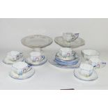 PART SHELLEY TEA SET IN AN ART DECO DESIGN WITH FLOWERS, PATTERN NO 11606, COMPRISING MILK JUG,