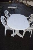 PLASTIC PATIO TABLE AND SET OF FOUR CHAIRS