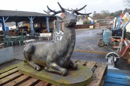 LARGE AND IMPRESSIVE BRONZED GARDEN FIGURE DEPICTING A RECUMBENT STAG 104CM LONG X 82CM HEIGHT X 86