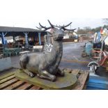 LARGE AND IMPRESSIVE BRONZED GARDEN FIGURE DEPICTING A RECUMBENT STAG 104CM LONG X 82CM HEIGHT X 86