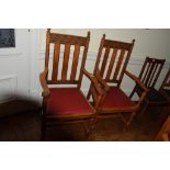 Set of eight early 20th century carved oak armchairs with red leather seats (8)