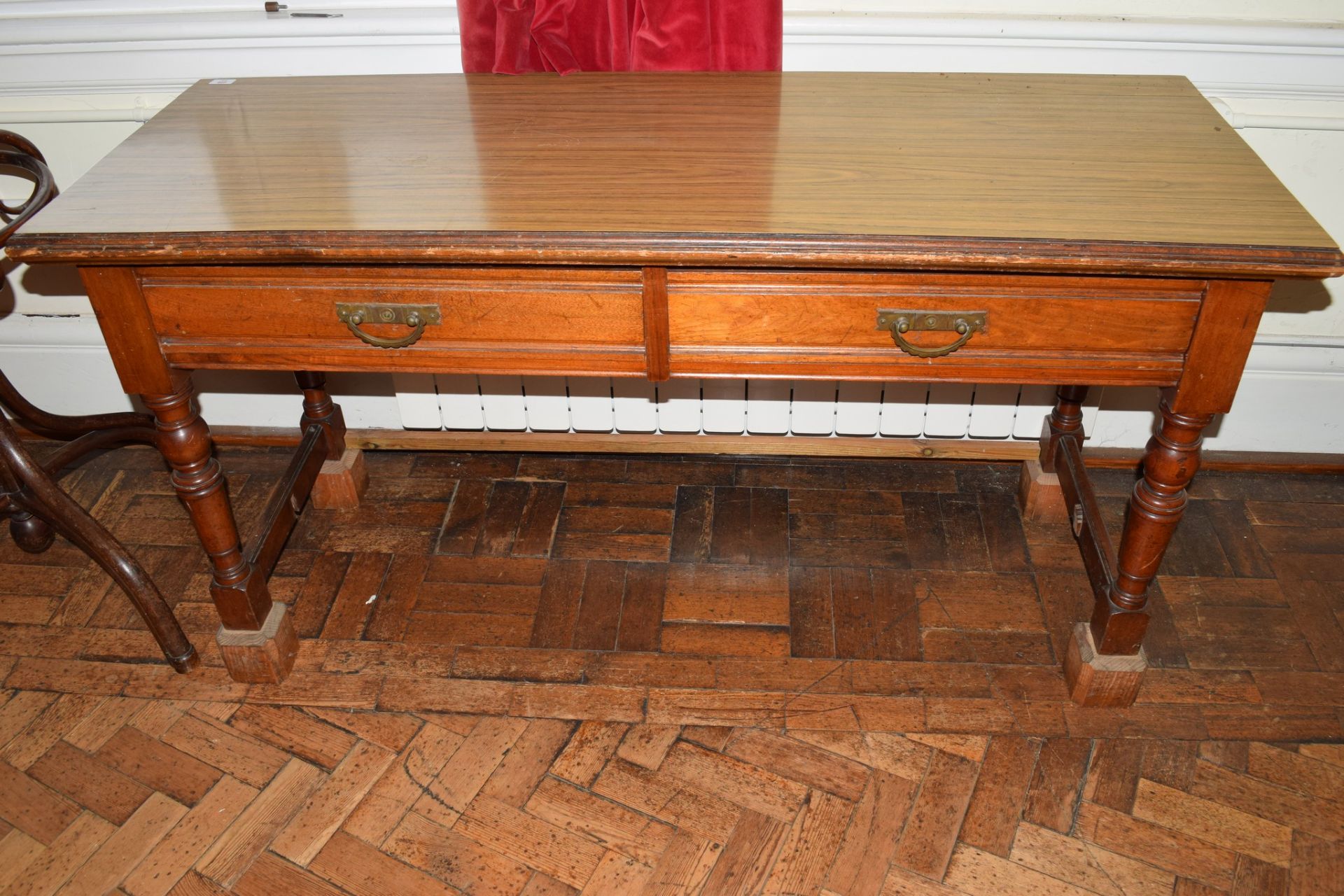 Victorian mahogany long two-drawer side table, on turned legs, end stretchers and having applied