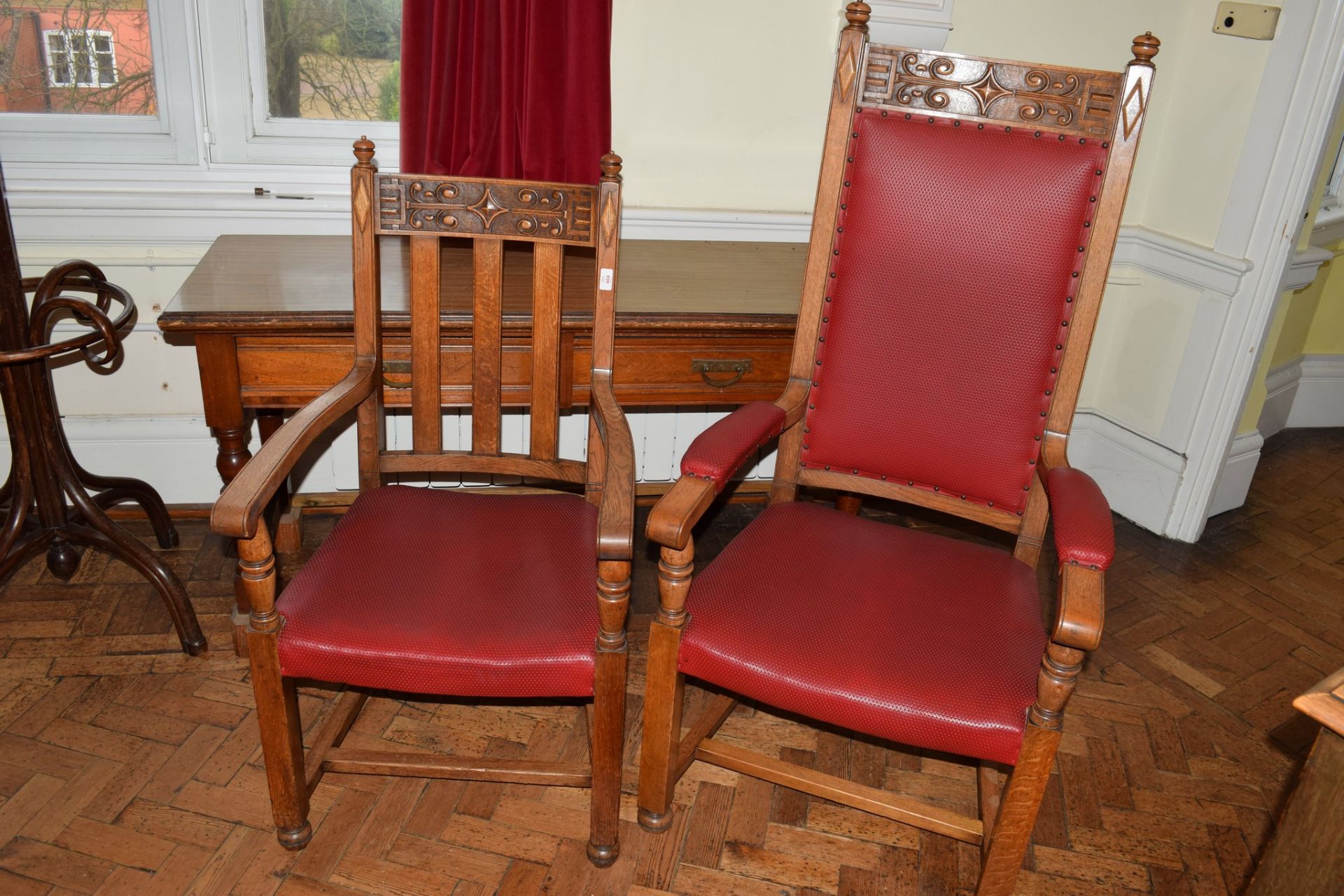 Extensive set of 13 (12+1) early 20th century armchairs comprising a Mayor’s carved oak “throne”
