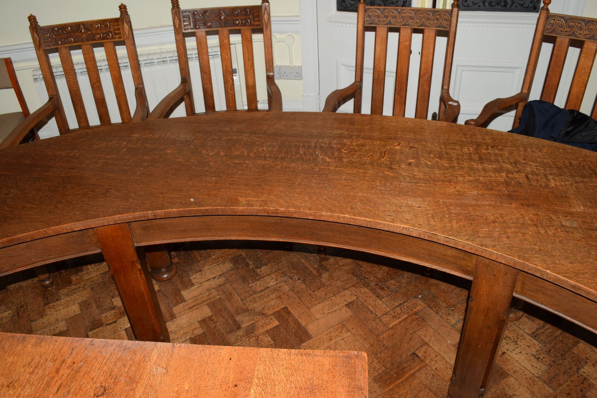 Set of three early 20th century oak committee tables of curved design, each on four chamfered square - Image 4 of 6