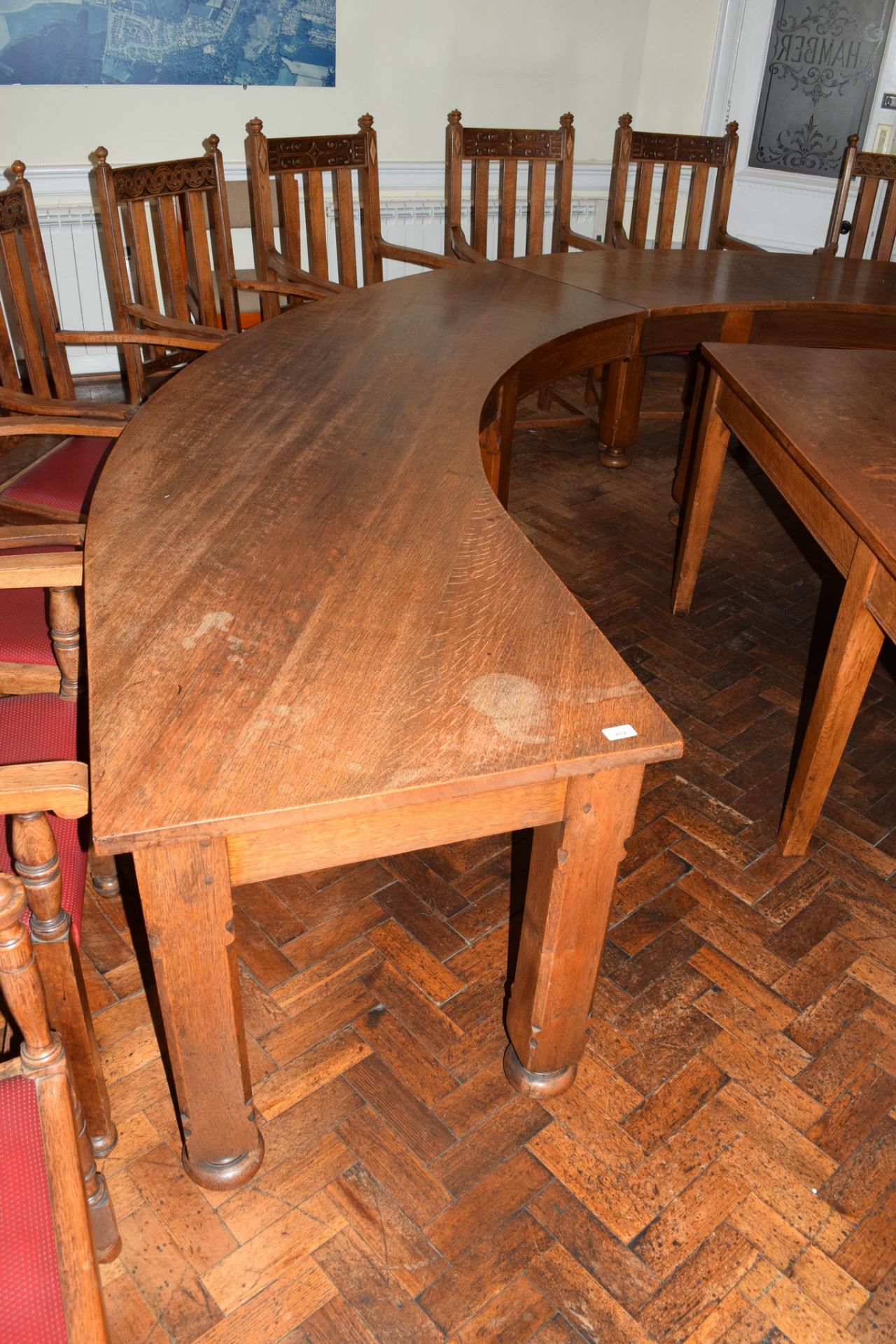 Set of three early 20th century oak committee tables of curved design, each on four chamfered square - Image 2 of 6
