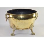 LARGE BRASS JARDINIERE WITH LION MASK HANDLES