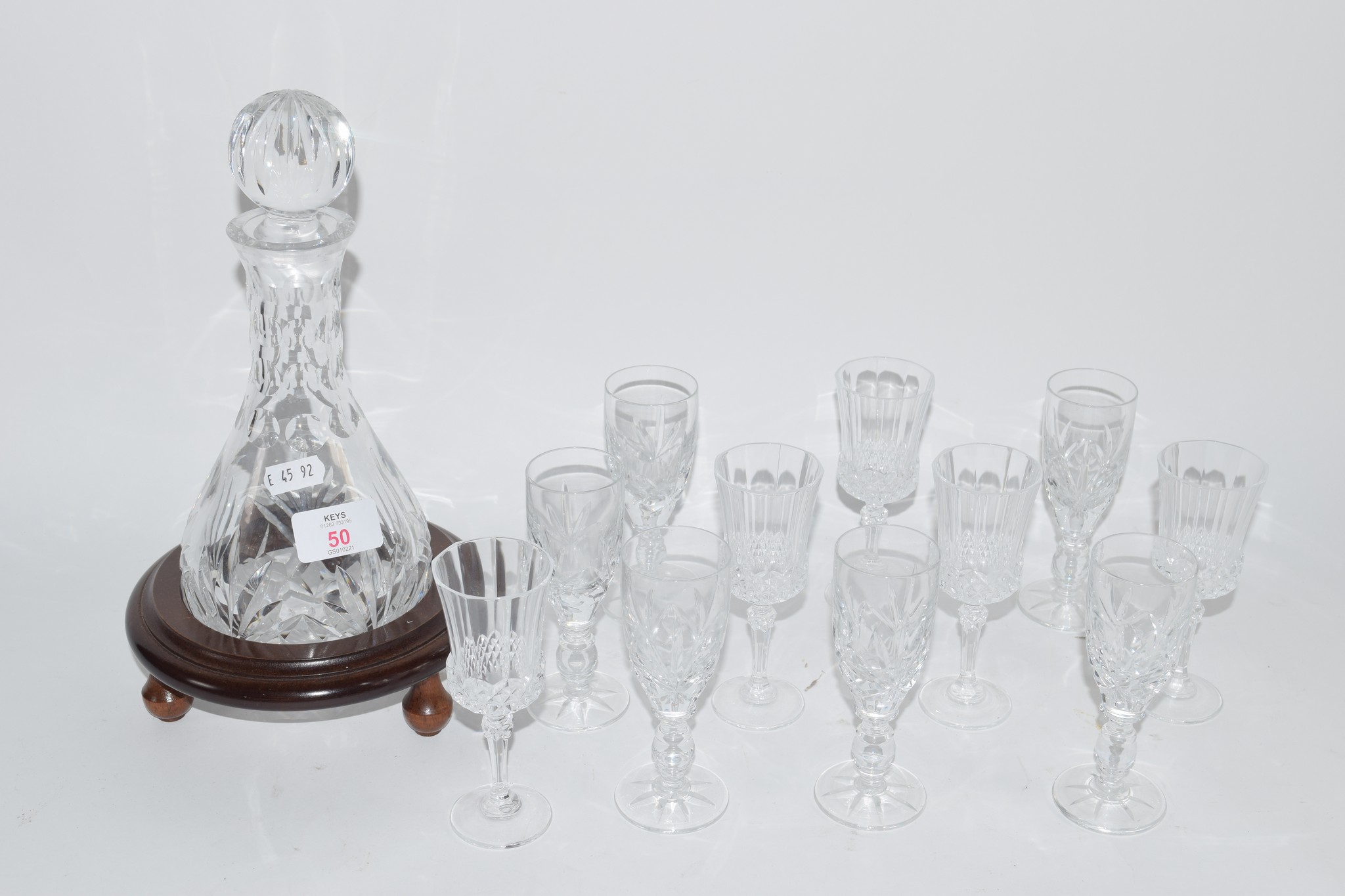 CUT GLASS DECANTER AND QUANTITY OF SMALL GLASSES