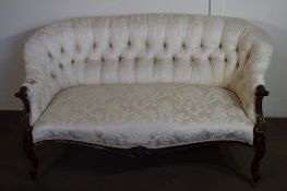 19TH CENTURY MAHOGANY FRAMED BUTTON BACK SOFA IN THE ROCOCO STYLE, RAISED ON CARVED LEGS OVER