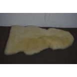 SHEEPSKIN RUG, APPROX LENGTH 106CM