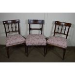 SET OF THREE LATE 19TH CENTURY UPHOLSTERED DINING CHAIRS WITH CARVED ROSETTE DECORATION, HEIGHT OF