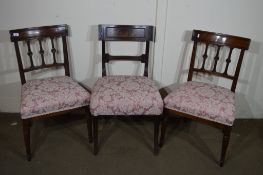 SET OF THREE LATE 19TH CENTURY UPHOLSTERED DINING CHAIRS WITH CARVED ROSETTE DECORATION, HEIGHT OF