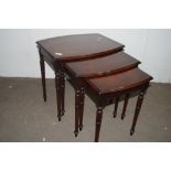 SET OF THREE BOW FRONTED MAHOGANY EFFECT NESTING TABLES, WIDTH APPROX 51CM