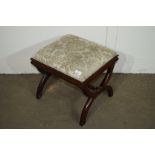 19TH CENTURY MAHOGANY UPHOLSTERED CAMEL STOOL WITH TURNED STRETCHER, WIDTH APPROX 41CM