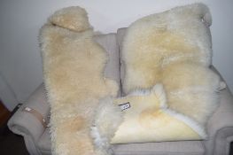 TWO SHEEPSKIN RUGS, EACH LENGTH APPROX 150CM