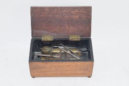 SMALL BOX CONTAINING A BOXED INSTRUMENT