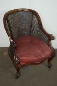 19TH CENTURY HEAVILY CARVED MAHOGANY BERGERE CHAIR