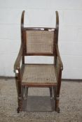 EARLY 20TH CENTURY CANE SEATED INVALID CHAIR, WIDTH APPROX 49CM