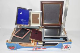 BOX CONTAINING PHOTO FRAMES, SOME WOODEN AND SOME SILVER PLATE