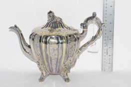 SILVER COLOURED METAL TEA POT IN CLASSICAL DESIGN