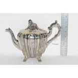 SILVER COLOURED METAL TEA POT IN CLASSICAL DESIGN