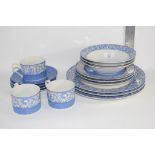 PART TEA SET IN A BLUE DESIGN COMPRISING DINNER PLATES, SIDE PLATES, BOWLS, 3 CUPS AND SAUCERS