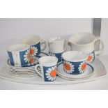 NORWEGIAN CERAMIC PART TEA SET IN THE DAISY PATTERN COMPRISING CUPS AND SAUCERS, ONE LARGE JUG,