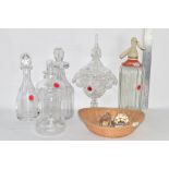 CUT GLASS DECANTERS AND STOPPERS AND A SODA SIPHON