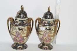 PAIR OF ORIENTAL VASES AND COVERS