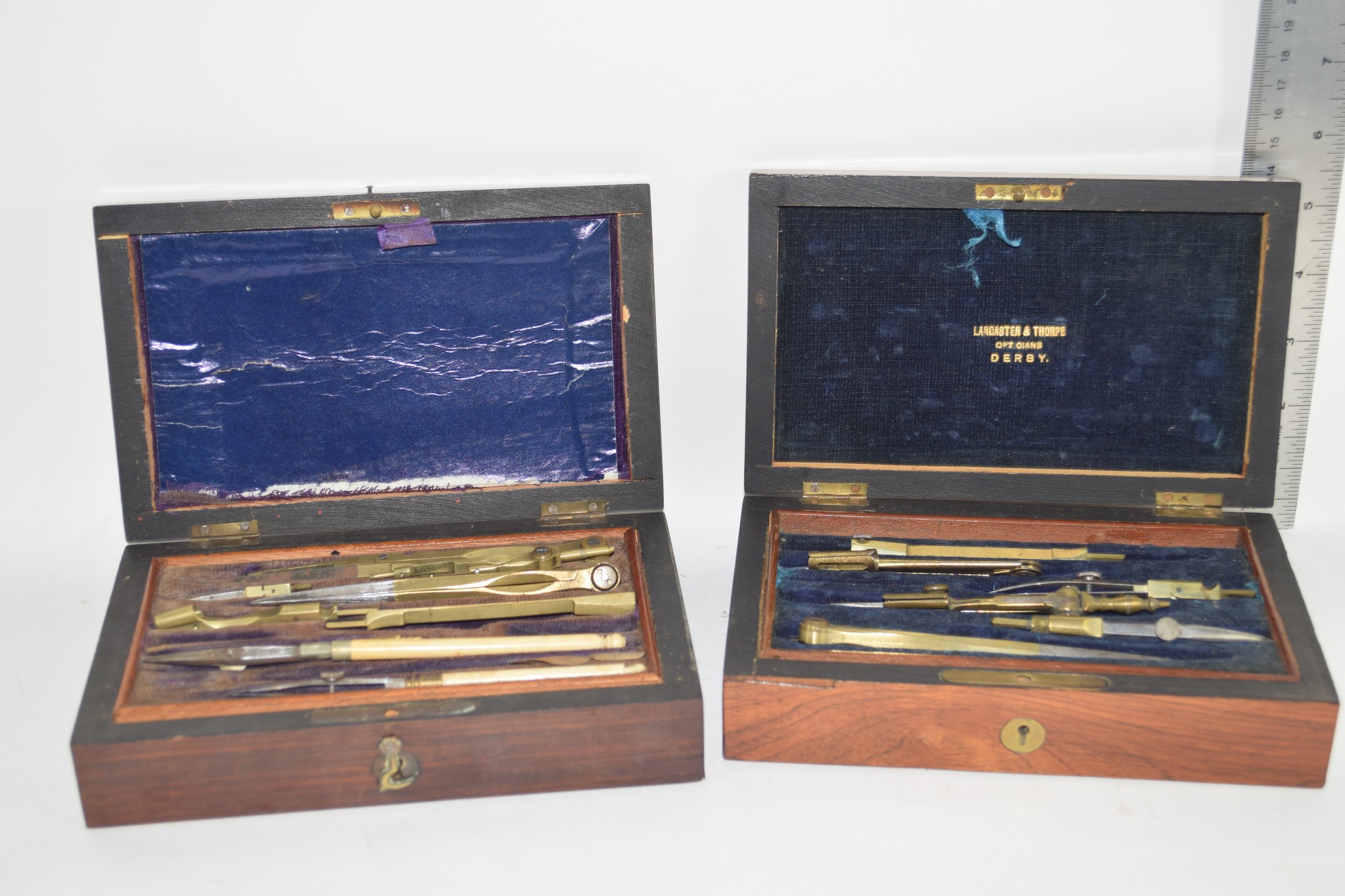 TWO BOXES OF MEASURING INSTRUMENTS, ONE MARKED LANCASTER & THORPE OPTICIANS, DERBY