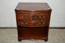 SMALL MAHOGANY FINISH BOW FRONTED LOW CHEST WITH LEATHER INSET BRUSHING SLIDE AND CROSS BANDED