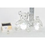 SMALL BOXED MODEL OF A BIRD, A FACET CUT GLASS MODEL OF A TEDDY AND A PENGUIN, POSSIBLY SWAROVSKI