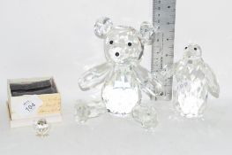 SMALL BOXED MODEL OF A BIRD, A FACET CUT GLASS MODEL OF A TEDDY AND A PENGUIN, POSSIBLY SWAROVSKI