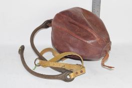 OLD LEATHER MODEL OF AN AMERICAN FOOTBALL