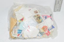 SMALL PLASTIC BAG CONTAINING STAMPS