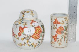 CERAMIC JAR AND COVER AND VASE DECORATED IN SIMILAR FASHION WITH FLORAL DESIGN