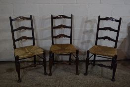 SET OF THREE RUSH SEATED LADDER BACK CHAIRS, EACH HEIGHT APPROX 102CM