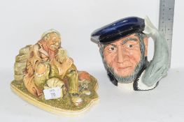 POTTERY MODEL OF A TRAVELLER "TRAVELLER'S REST", TOGETHER WITH A ROYAL DOULTON CAPTAIN AHAB