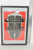 ADVERTISING FOR THE LODGE "BEST PLUG IN THE WORLD" IN WOODEN FRAME