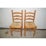 PAIR OF MODERN VARNISHED PINE RUSH SEATED DINING CHAIRS, HEIGHT APPROX 96CM