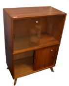 Mid-century teak two-part cabinet, the top with two glass sliding doors, the base with two solid