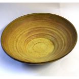 Studio pottery bowl with ridged interior, the exterior with a grey slip, 27cm diam