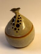 Small Art Pottery bowl and cover, the cover with pierced decoration, the base signed "Susan Riley