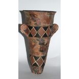 Tapering cone shaped vase with two small handles and geometric designs by A M Magson, 20cm high