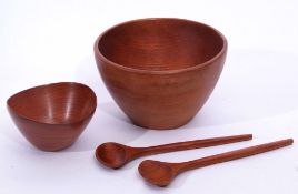 Mid-20th century Danish teak serving bowl together with a smaller example and serving tongs, largest