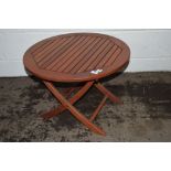 SMALL LOW FOLDING HARDWOOD CIRCULAR TABLE, DIAM APPROX 64CM