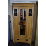 EARLY 20TH CENTURY MIRROR FRONT SINGLE WARDROBE WITH TYPICAL ARTS & CRAFTS FEATURES, WIDTH APPROX